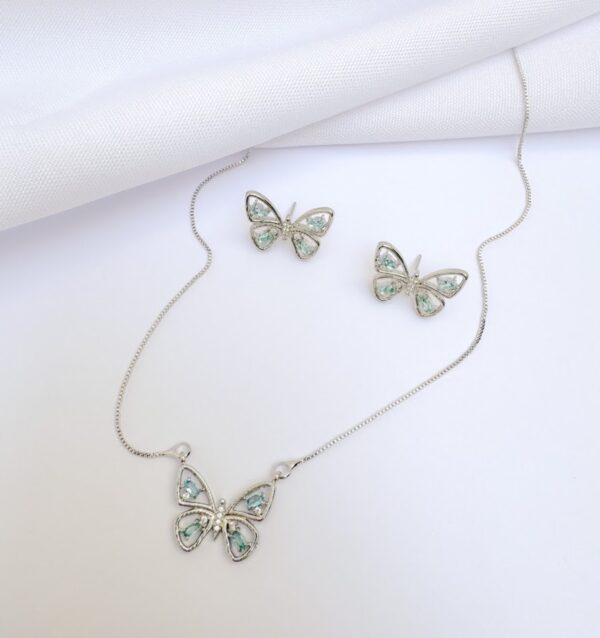 Conjunto Borboleta com Navete e Cristal Azul Banho Branco